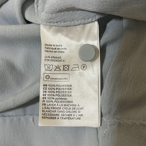 H & M Beautiful long sleeve Light Blue blouse. - Picture 10 of 11